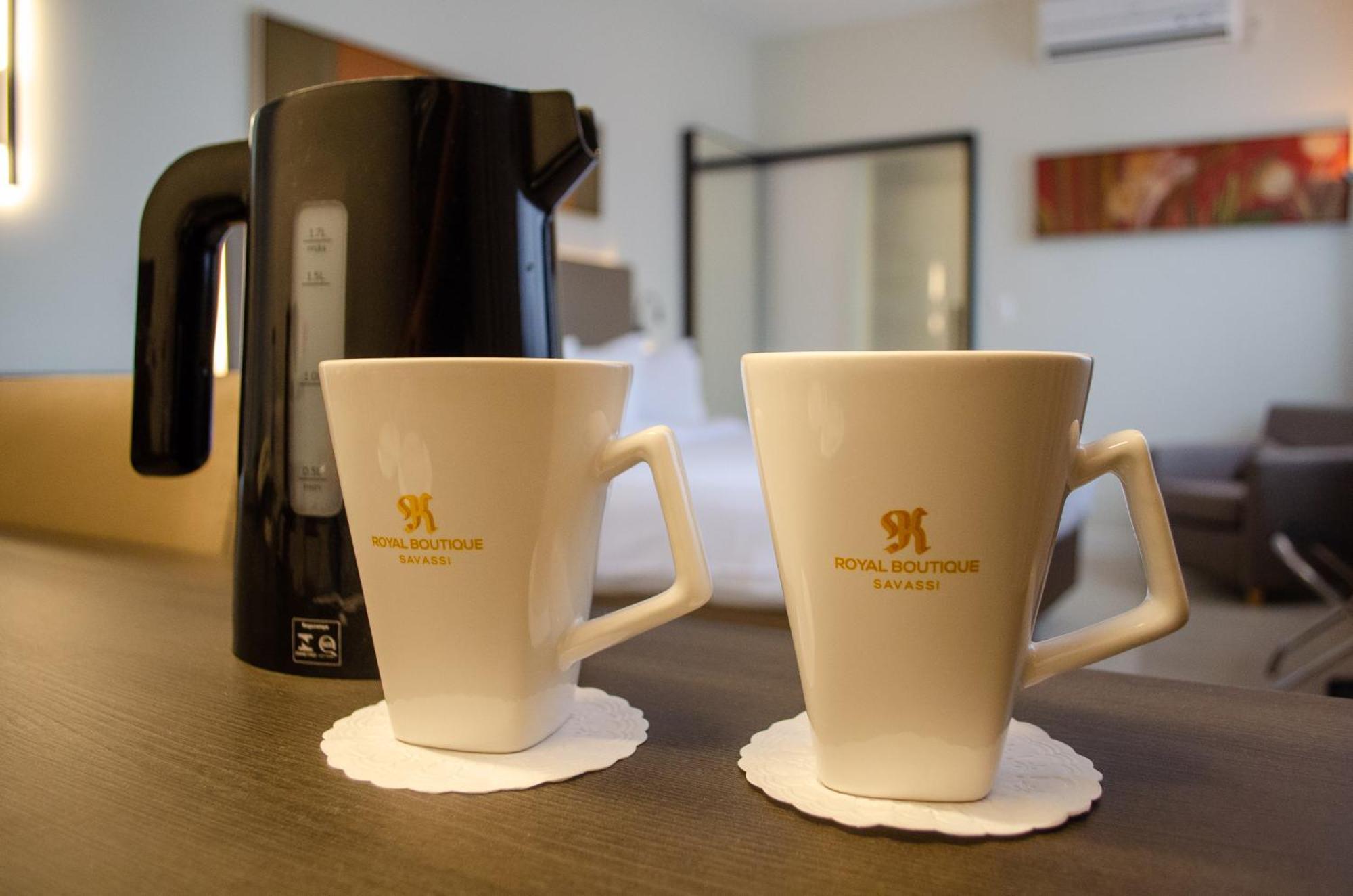 Royal Boutique Savassi Hotel Belo Horizonte Exterior foto A kettle and two cups
