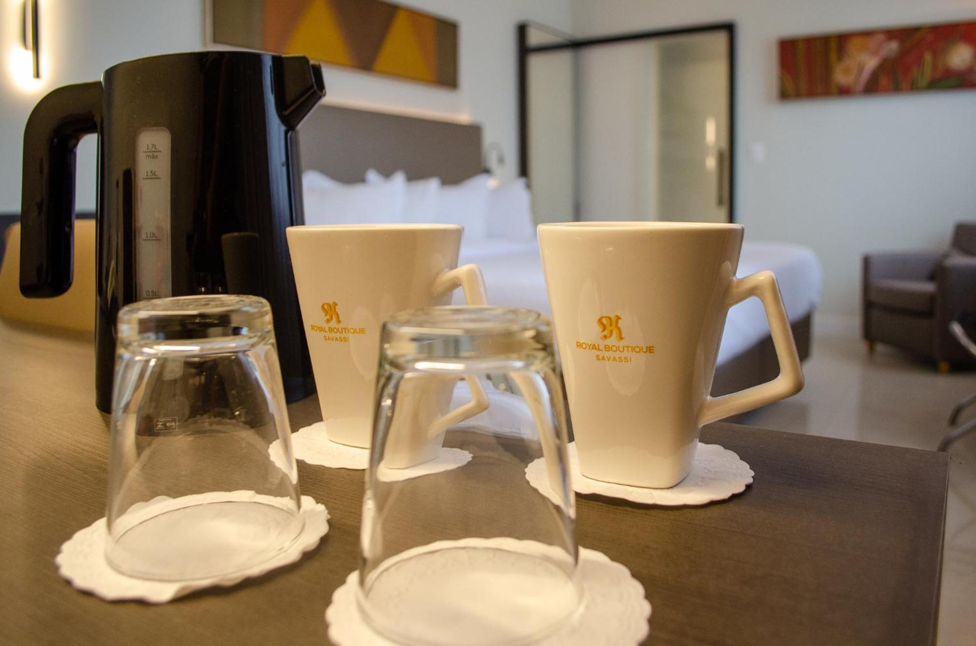Royal Boutique Savassi Hotel Belo Horizonte Exterior foto A coffee pot and two cups