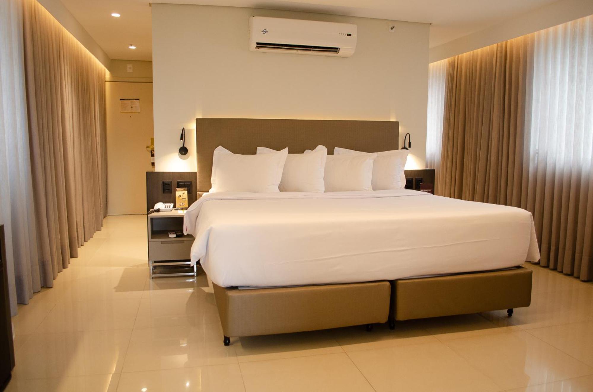 Royal Boutique Savassi Hotel Belo Horizonte Exterior foto A bedroom at the hotel